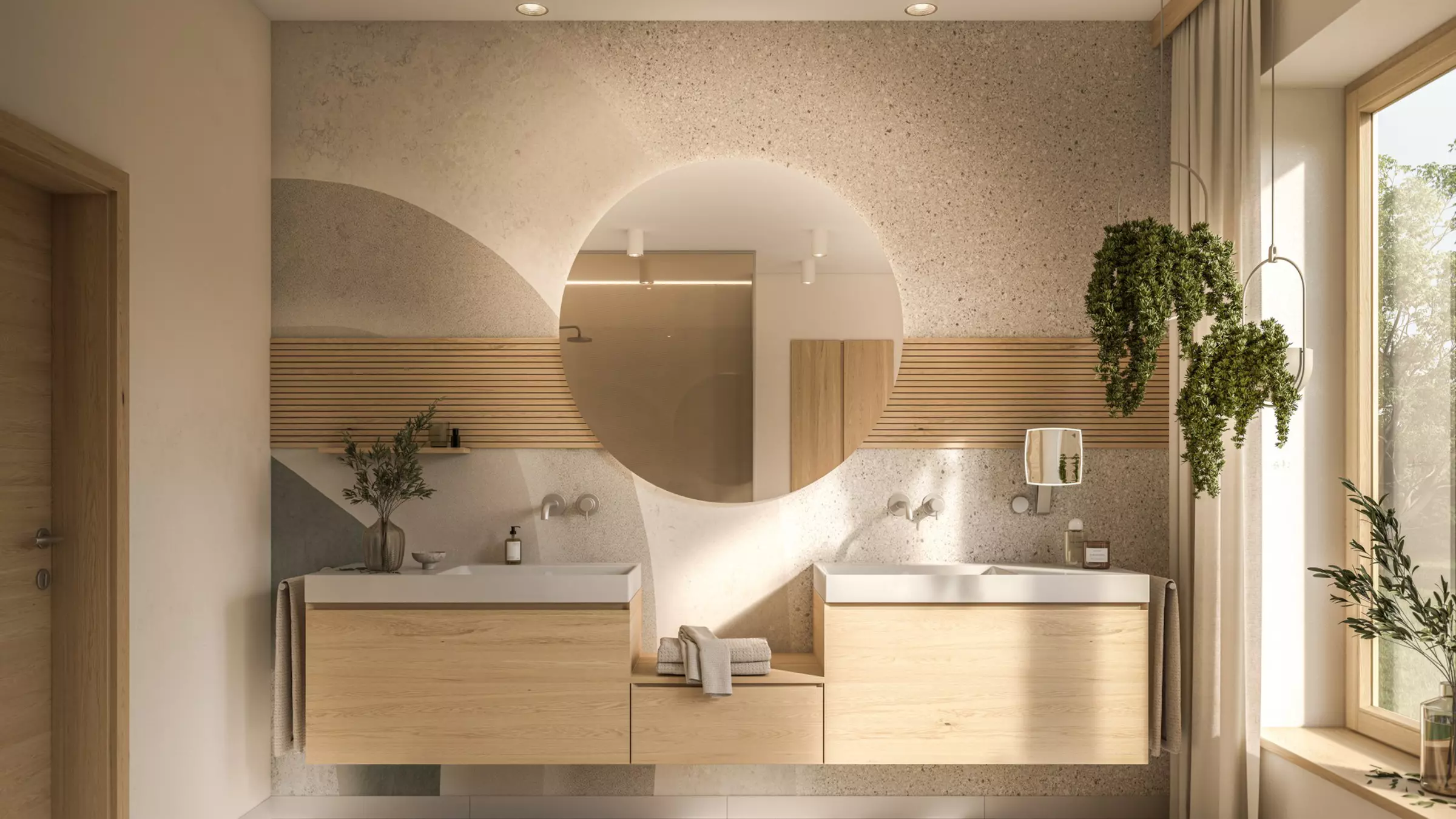 Zwei Waschtische mit rundem Spiegel und Holz-Unterschränken in einem Licht durchfluteten Badezimmer.